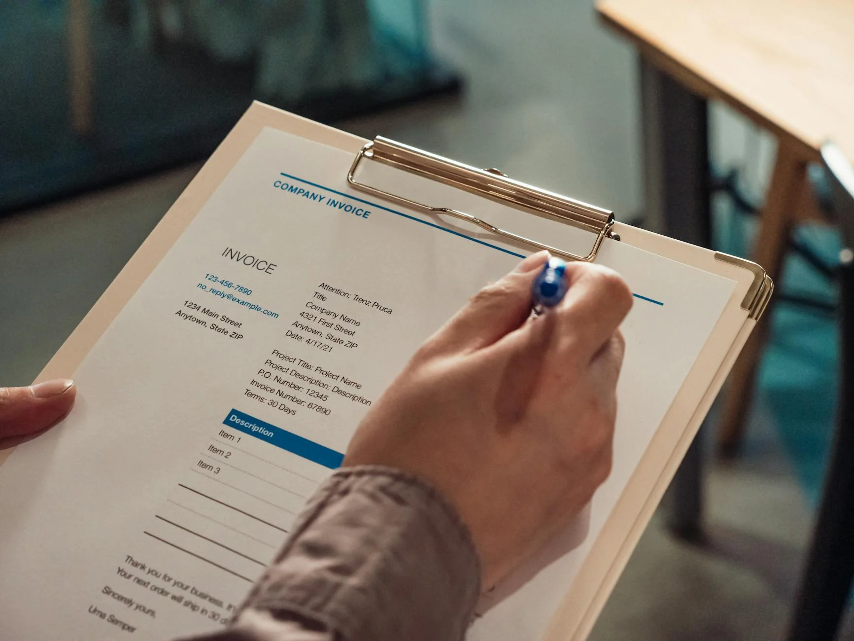 Construction payment application paperwork on a desk, the kind of artifact every pay app tool generates a version of